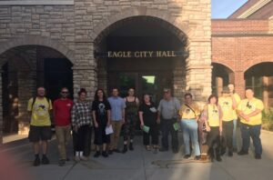 Photo of Riviera Estates Tenants' Union members at Eagle City Hall to protest development permits.