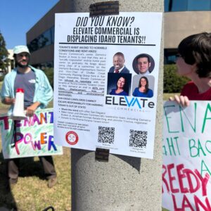 Flyer shaming elevate commercial leadership taped to a telephone pole. Features photos of four top executives taken from Elevate Commercial's website with the title "Did You Know? Elevate Commercial is Displacing Idaho Tenants."